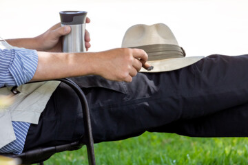 Relaxing with a drink and cigar