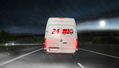 Courier transporter service truck at night at bad weather to deliver package .