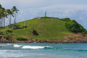 Salvador Bahia Brazil - 02 14 2021: The beautiful sculpture of Cristo Redentor, located in Morro do Cristo, in Barra, was sculpted in Carrara marble by the Italian artist Pasquale De Chirico