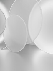 3D Rendering Soft Light and Semi Transparent Circle Plates Overlapping Product Display Background for Skincare or Healthcare Products. Simple Matte White and Gray.