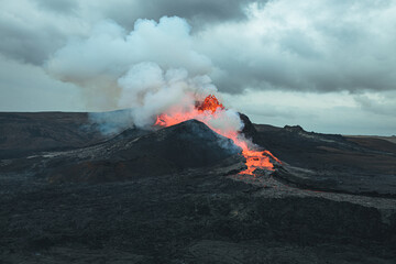 Enormous volcano covered in smoke and lava in Iceland.  © Veniamin