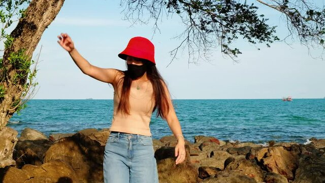 Happy carefree sensual woman with red hat