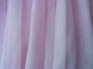 Pink tulle texture. Tulle close-up. Photo. Background.