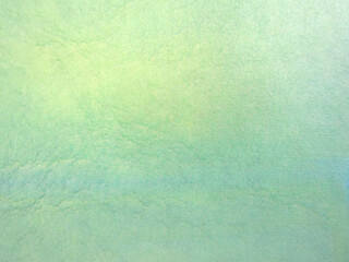 淡いブルーとイエローの背景素材　汚れた壁のイメージ