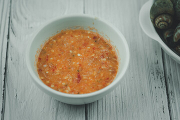 Thai seafood sauce in a white bowl