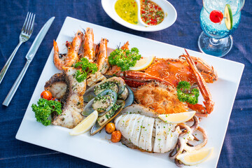 seafood platter with spicy sauce