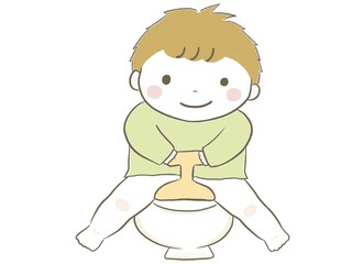 おまるでトイレトレーニングをするかわいい笑顔の男の子