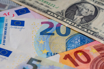 european euro and american dollars banknotes background, selective focus