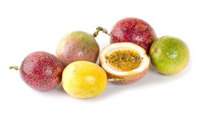Isolated passionfruits. One and a half passion fruits (maracuya) isolated on white background