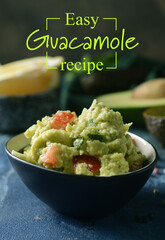 Bowl of delicious guacamole on table