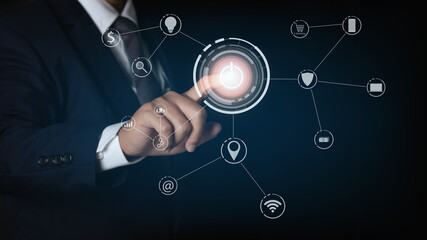 businessman pushing power button. connection network icon.
