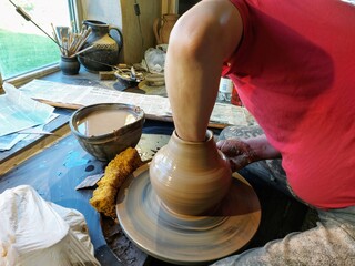 Hands of a Latvian potter