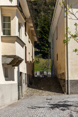 Fototapeta na wymiar View of the old houses in the alpine village of Poschiavo in Switzerland during spring