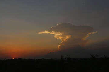 Fototapeta premium sunset with cloud hats
