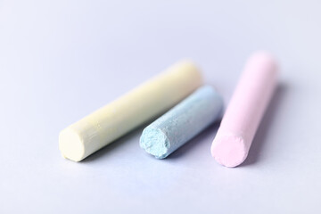 Soft pastels on bright background. Close up.	