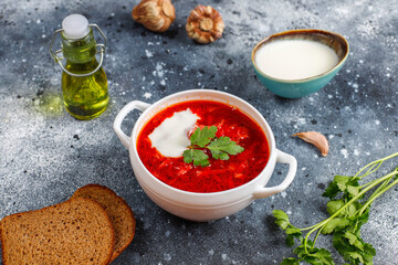Traditional Ukrainian Russian borscht or red beetroot soup in the bowl.