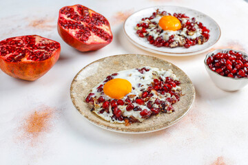 Traditional Azerbaijan cuisine pomegranate seeds with egg narnumru or nar numru.
