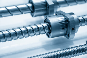 Obraz na płótnie Canvas The close-up scene of linear lead ball screw spare part assembly set . The hi-precision CNC machine manufacturing concept.
