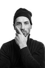 black and white portrait of a thoughtful young man.