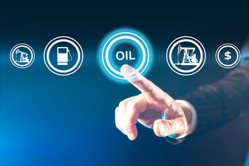 The buttons symbolize the oil market. The businessman puts his finger to the Oil button on the virtual screen. Oil production. Fuel price. Energy resources concept.