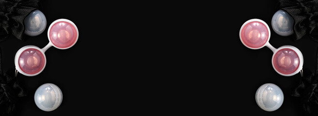 Banner, Ben Wa vaginal pleasure balls, Kegel balls on a black background, top view, empty space for text