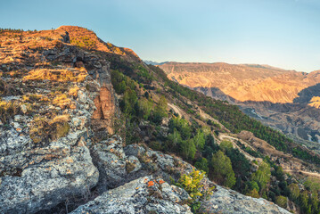 The Keger plateau in Dagestan. Morning sunrise view of the valley and the gorge with the river.