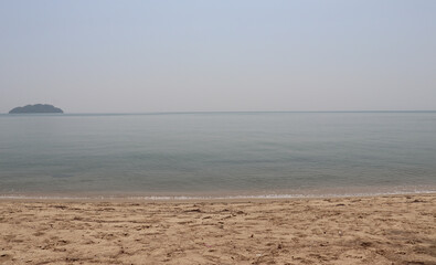 Sandy beach Bright sky Calm sea Only the wind Fresh air The environment is good and there are no people. It is a destination for relaxation that requires a lot of peace. photo in Thailand