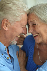 cheerful senior couple at home