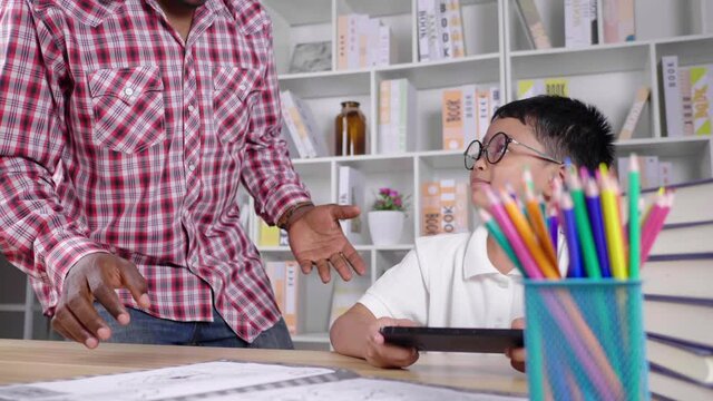 Kid Playing Game And Teacher Waking To A Boy To Make A Complain In Private Class. Private Learning, Study At Home In Covid 19 Situation, Boring Class