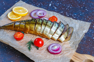 Slices of smoked fish mackerel or scomber.