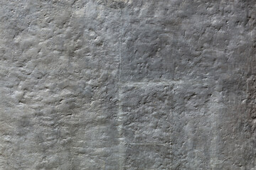 Gray wall, textured and weathered
