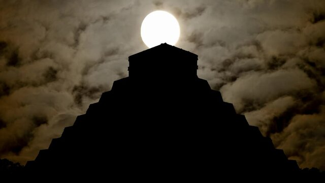 Mayan Pyramid in Silhouette, Time Lapse by Night with Dark Atmosphere, Fog, Smoke, and Full Moon, Chichen Itza, Mexico