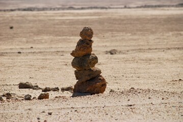 Stone sculpture in the Namibian desert on a sunny day