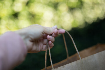 Holding a shopping bag