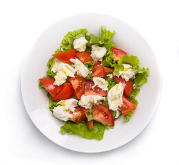 salad with tomatoes and feta cheese isolated