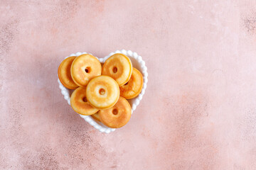 Fototapeta na wymiar Homemade mini donuts with powdered sugar.