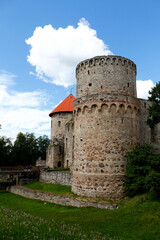 Fototapeta na wymiar Medieval knight's castle in clear sunny weather in the old town of Cesis, Latvia