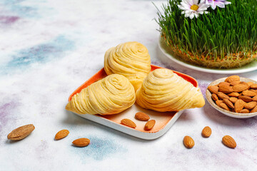 Obraz na płótnie Canvas Traditional Azerbaijan holiday Novruz sweet badambura with almond.