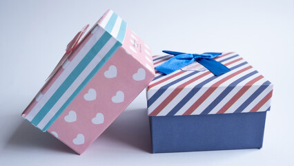 A multi-colored gift box with an open lid. Empty gift boxes on white background with shadow, isolated.