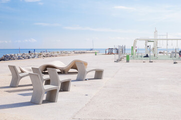 horizontal bars and sports playground on the beach on a sunny day