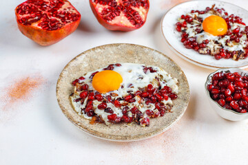 Traditional Azerbaijan cuisine pomegranate seeds with egg narnumru or nar numru.