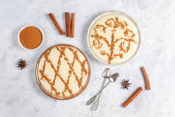 Azerbaijani firni sweet dessert with cinnamon powder.