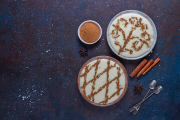 Azerbaijani firni sweet dessert with cinnamon powder.