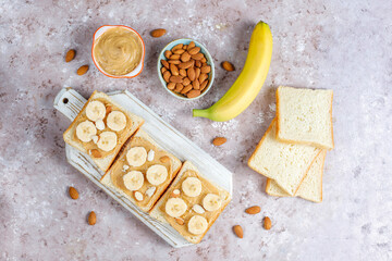 Sandwich with peanut butter and banana slices.