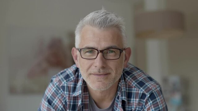 Portrait of 50-year-old man with eyeglasses