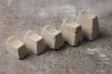 Concrete spacers for rebar, various sizes