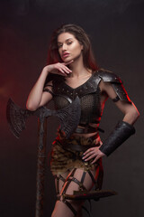 Barbaric woman viking with hand under her chin