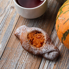 Country style pasty, autumn seasonal pumpkin pie close up, top appetizing view