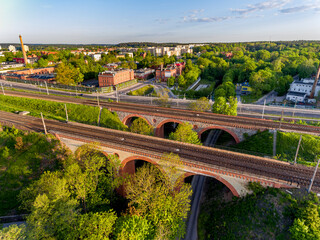 Fototapeta premium Complex of railway bridges over the Łyna River in Olsztyn - spring, Warmia and Mazury, Europe