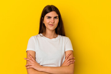 Obraz premium Young caucasian woman isolated on yellow background unhappy looking in camera with sarcastic expression.